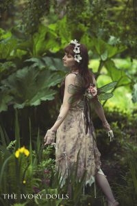 Midsummer Faery Dress in cream colourway and Midsummer Faery Gloves in cream colourway by The Ivory Dolls. Flower Crown and Wings by Under The Ivy. Modelled by Jess Louise. Makeup by Victoria Thomas. Photography by DanniellaJaine.