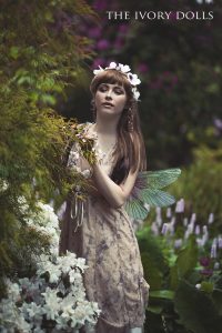 Midsummer Faery Dress in cream colourway and Midsummer Faery Gloves in cream colourway by The Ivory Dolls. Flower Crown and Wings by Under The Ivy. Modelled by Jess Louise. Makeup by Victoria Thomas. Photography by DanniellaJaine.